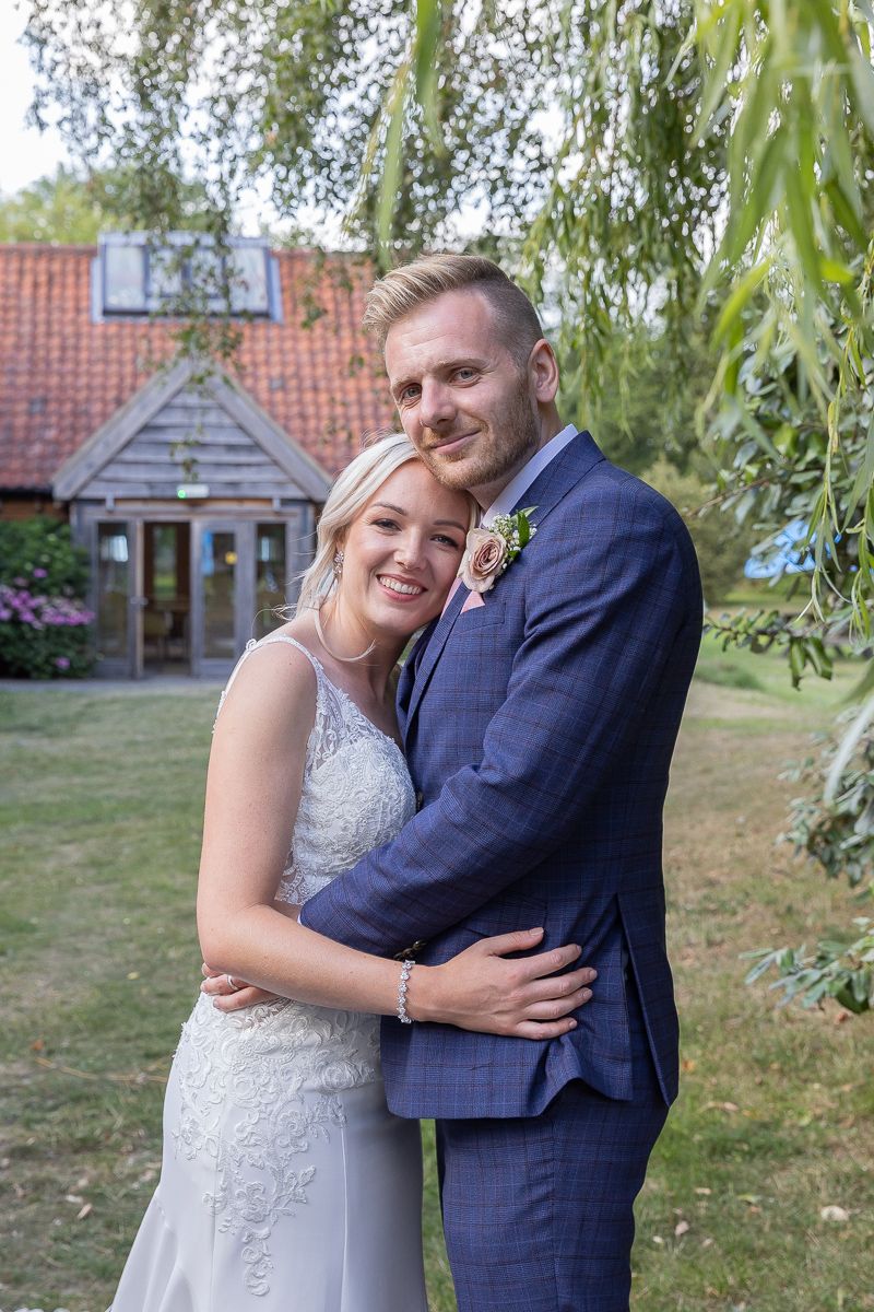 A bride and groom share a quiet moment