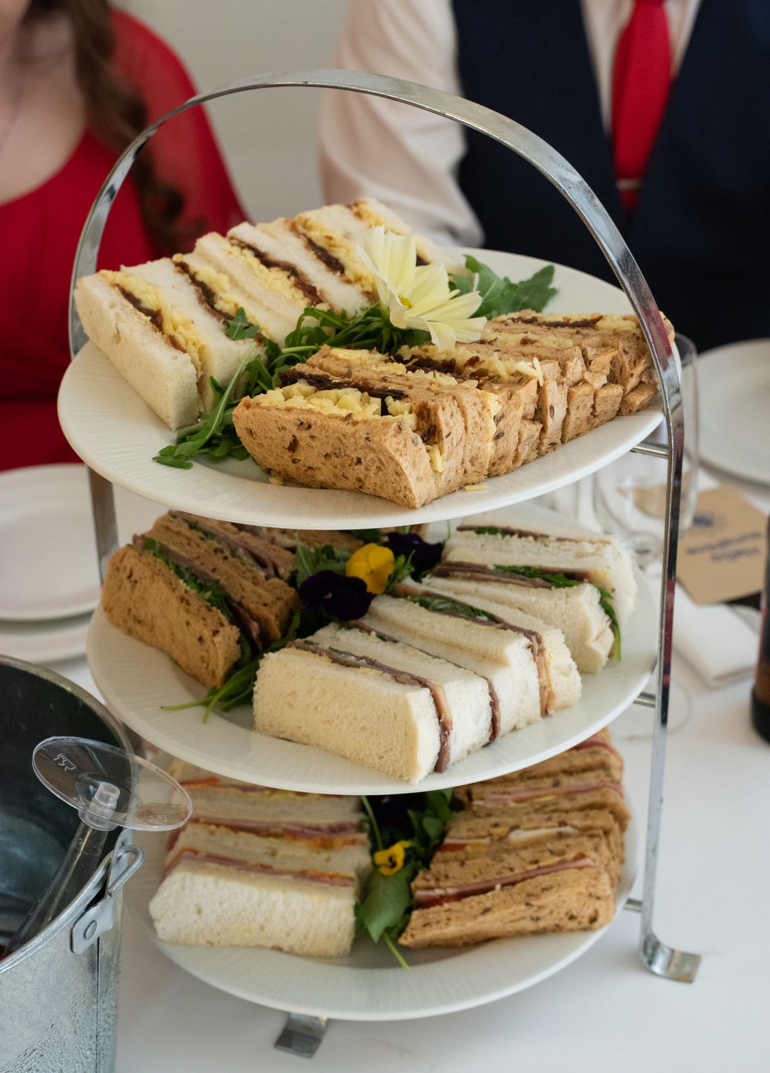 A tiered stand of finger sandwiches for afternoon tea